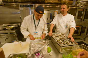 Chef Franco Wayne Lee, left, takes some gentle workplace jibes in stride from Chef Anton Brunnauer at the Fire Rock Casino on Friday.— © 2009 Gallup Independent / Adron Gardner