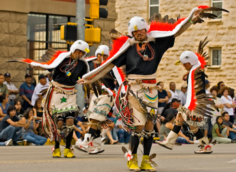 Members of the San Juan Pueblo Dance Group perform for the crowds lining Historic Rt. 66 in downtown Gallup in this Aug. 11, 2007, file photo taken during the 86th Annual Inter-Tribal Indian Ceremonial. — © 2009 Gallup Independent / Staff Photo