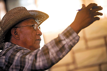 Pinedale area resident Teddy Nez addresses Environmental Protection Agency representatives during a public meeting about soil contamination caused by the Northeast Church Rock Mine at the Pinedale chapter house Tuesday. — © 2009 Gallup Independent / Cable Hoover 