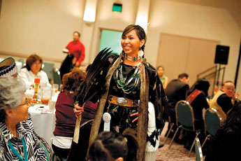 Caitlin Reynolds of Gallup shows off her traditional dress during a luncheon for this year's ceremonial queens. Reynolds is affiliated with the Southern Cheyenne tribe. — © 2009 Gallup Independent / Brian Leddy 
