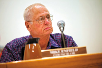 City council member Mike Enfield listens during the city council meeting at City Hall Tuesday. — © 2009 Gallup Independent / Cable Hoover 