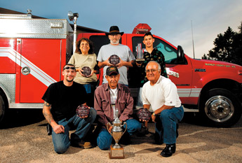 The Bluewater Acres Fire Department recently won several awards in the Tri-State Fire Fighters Association Convention. Pictured are (front, from left) Erik Crohn, Jacob Campos and Tom Saucedo; (back) Mary Lou Fech, Ron Lawrence and Jacob Campos II. — © 2009 Gallup Independent / Brian Leddy 