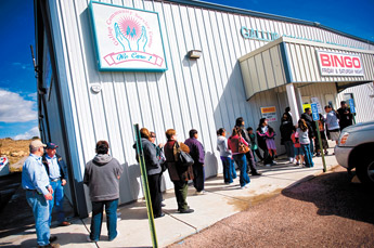 A line of people wait to receive a flu vaccination Wednesday at the Gallup Community Center. Thousands took advantage of free flu shots, which did not include the H1N1 vaccination. — © 2009 Gallup Independent / Cable Hoover