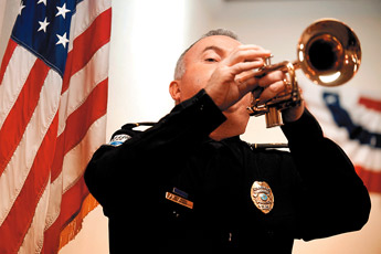 The Rev. Mike Kleeberger, Gallup Police Department chaplain and pastor at Emmanuel Baptist Church, plays the trumpet during the Law Enforcement Appreciation Day service at Emmanuel Baptist Church on Sunday. — © 2009 Gallup Independent / Brian Leddy
