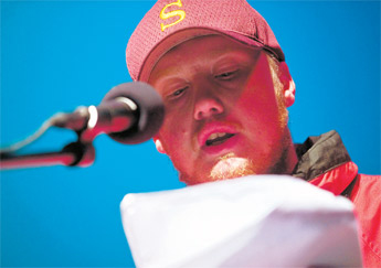 Max Cloud recites some his original poetry during an open mic event at El Morro Theatre in Gallup Saturday. — © 2009 Gallup Independent / Cable Hoover 