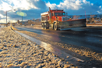 Snow plows hit the streets in Gallup on Tuesday to help clear roads after a heavy freeze moved in on Monday night. — © 2009 Gallup Independent / Adron Gardner