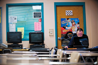 Gallup High School teacher Bob Gearhart works on filing students' grades at the end of the day in his classroom at Gallup High School Thursday. — © 2010 Gallup Independent / Cable Hoover 