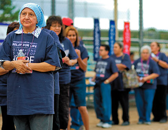 Marcella Alderete and fellow cancer survivors are recognized in the opening ceremonies for the 2009 Relay for Life at the Gallup Sports Complex on Friday. &mdash;&nbsp;&copy; 2009 Gallup Independent / Adron Gardner 