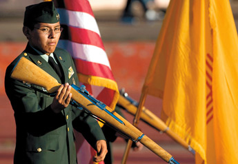 Gilford Yazzie drills before presenting flags with the color guard before Gallup and Farmington faced off for football at the Public School Stadium on Friday. &mdash;&nbsp;&copy; 2009 Gallup Independent / Brian Leddy 