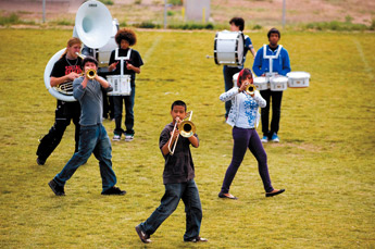 Grants High School marching band students practice their routine on Tuesday after school. The band is in the process of preparing for a state music competition. &mdash;&nbsp;&copy; 2009 Gallup Independent / Brian Leddy 
