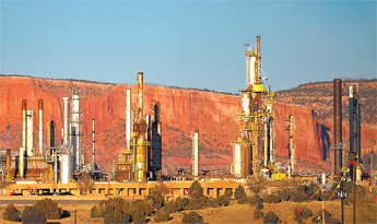 Western Refinery Co. will pay out a $1.95 million settlement to the Carlsbad-based Center for Excellence in Hazardous Material Management. &mdash;&nbsp;&copy; 2009 Gallup Independent / Adron Gardner 